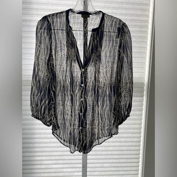 Feyi lace and exaggerated sleeve blouse